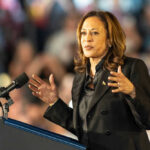 I dont know who this is speaking at podium