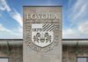 Loyola University Chicago emblem displayed on a building