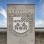 Loyola University Chicago emblem displayed on a building