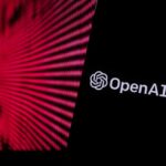 Close-up of a smartphone displaying the OpenAI logo against a vibrant digital background