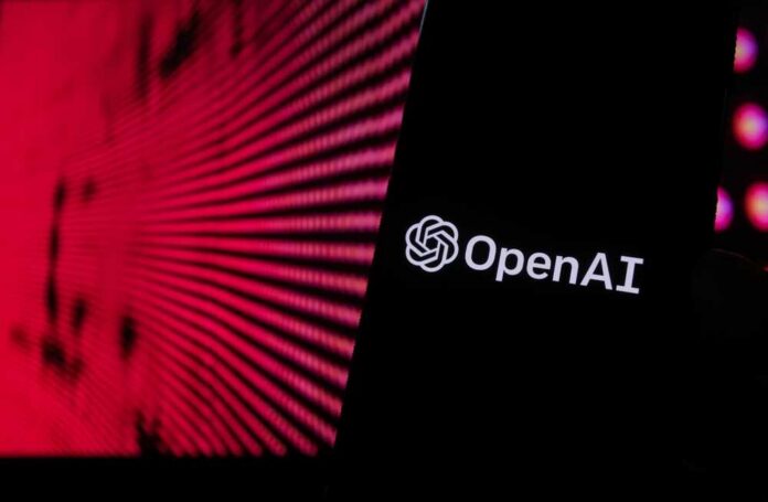 Close-up of a smartphone displaying the OpenAI logo against a vibrant digital background
