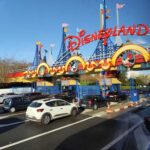 Entrance to Disneyland with cars waiting in line