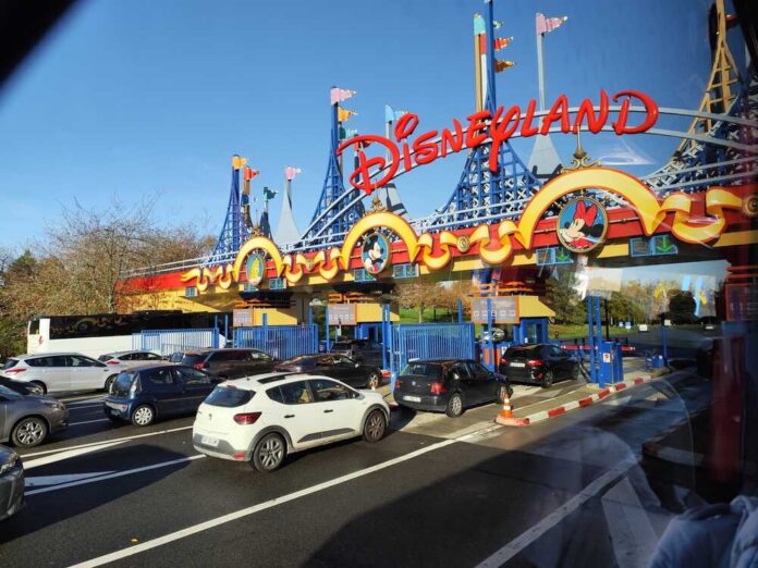 Entrance to Disneyland with cars waiting in line