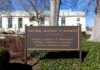 Sign for the National Academy of Sciences in front of a building