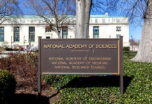 Sign for the National Academy of Sciences in front of a building