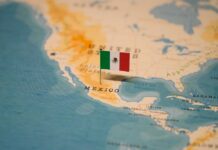 Map highlighting Mexico with a small flag