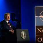 U.S. president delivering a speech at a NATO summit
