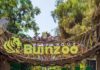 Entrance sign of Bioparque Buinzoo featuring cartoon animals