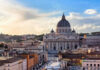 St Peters Basilica with surrounding cityscape at sunset