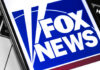 Close-up of the Fox News logo displayed on a smartphone screen