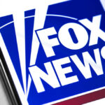 Close-up of the Fox News logo displayed on a smartphone screen