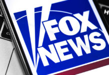 Close-up of the Fox News logo displayed on a smartphone screen