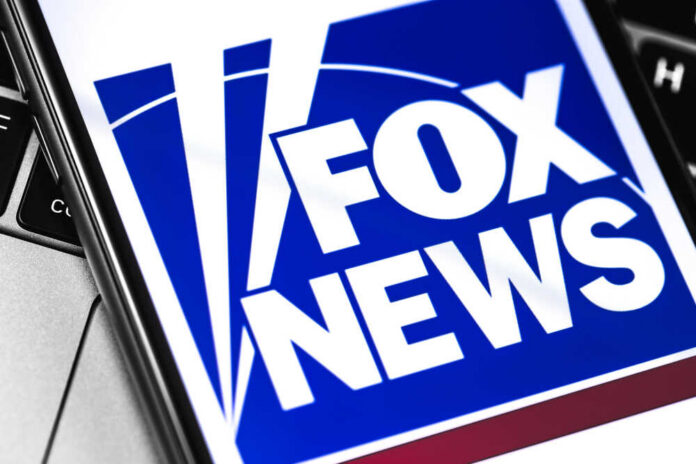 Close-up of the Fox News logo displayed on a smartphone screen