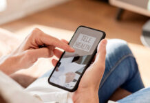 Person using a smartphone to access telehealth services
