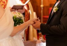 Bride and groom exchanging rings during a wedding ceremony