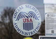 Social Security Administration USA logo on glass door.