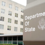Department of State sign outside government building