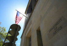 United States flag Department of Justice building exterior