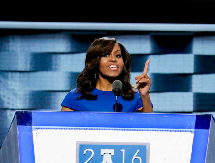 I dont know who this is speaking at a podium
