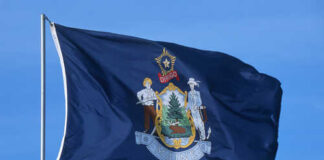 Flag of Maine featuring the state seal and blue background