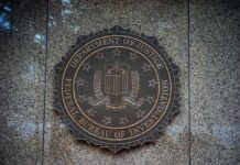 FBI seal on a granite wall
