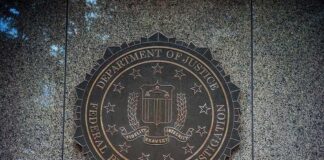 FBI seal on a granite wall
