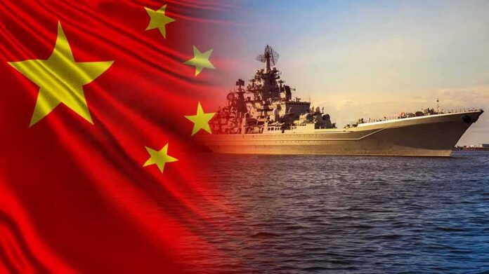 Chinese flag overlay with a large naval warship at sea