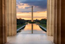 Washington Monument reflected in the Reflecting Pool at sunset