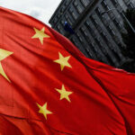 Close-up of the Chinese flag waving in the wind