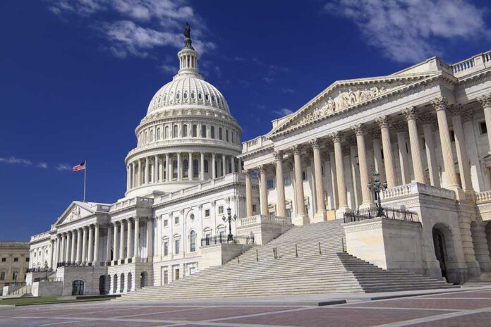 The,Eastern,Facade,Of,The,Us,Capitol,Building,,Washington,Dc The U.S. Capitol building with its dome and columns under a blue sky