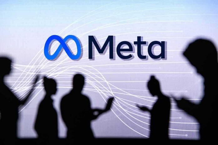 shutterstock_2131709785 Meta logo with silhouetted people using devices