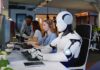 Robot and office workers at computers in a modern workspace