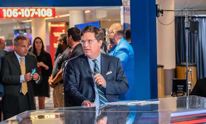 News anchor in suit at a studio desk