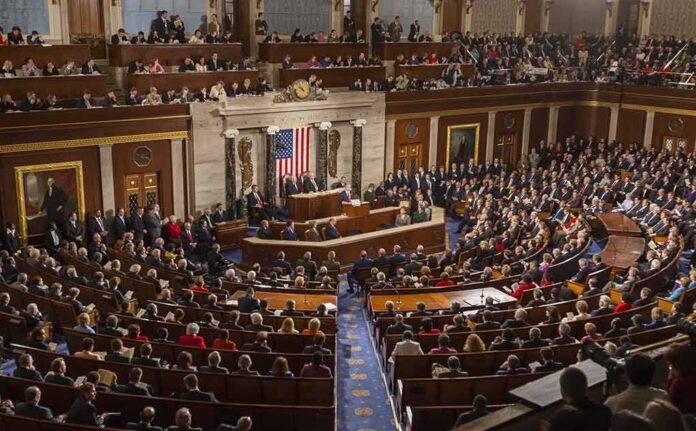 Legislative chamber filled with attendees during a formal address