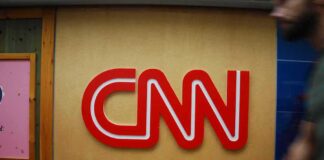 CNN logo on a wall