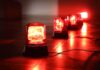 Red emergency beacons on a floor