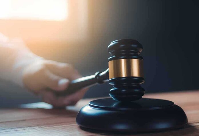 shutterstock_1563725260 judge’s gavel on a wooden block