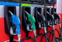 Fuel pump nozzles at a gas station