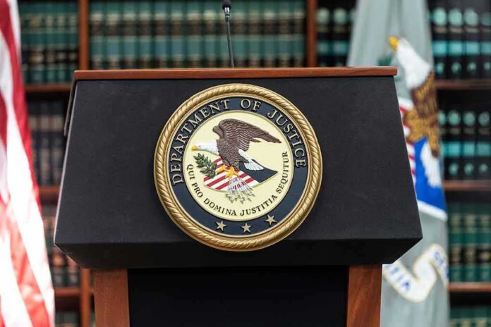 Department of Justice podium with seal in front of bookshelves