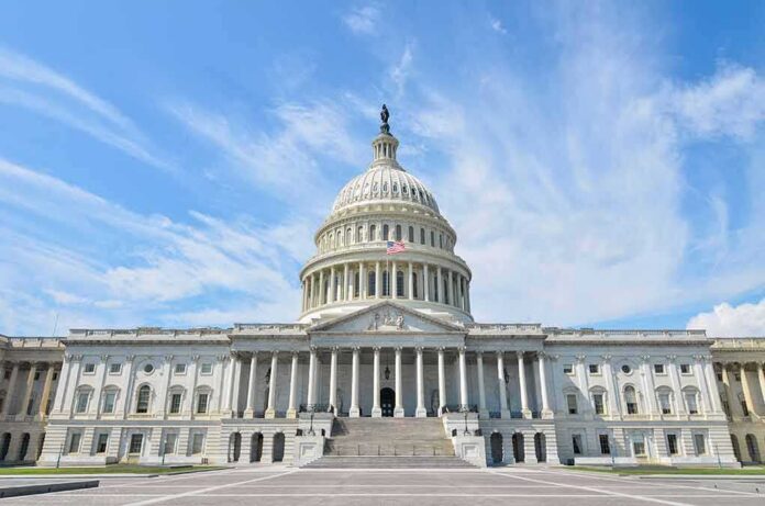 shutterstock_113019124 United States Capitol building with dome under a blue sky
