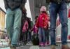 Crowd walking on a train platform