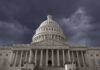 United States Capitol building under stormy skies