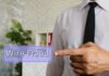 Businessperson pointing at wire fraud text overlay